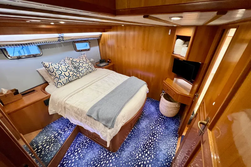 Slide: The Image of Luxurious cabin interior of 2000 Ocean Alexander 430 Classicco yacht with cozy bed and decor. - 32