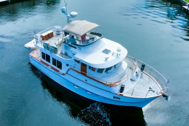 Slide: The Image of Ocean Alexander 430 Classicco yacht, 2000 model, cruising on calm waters. - 2