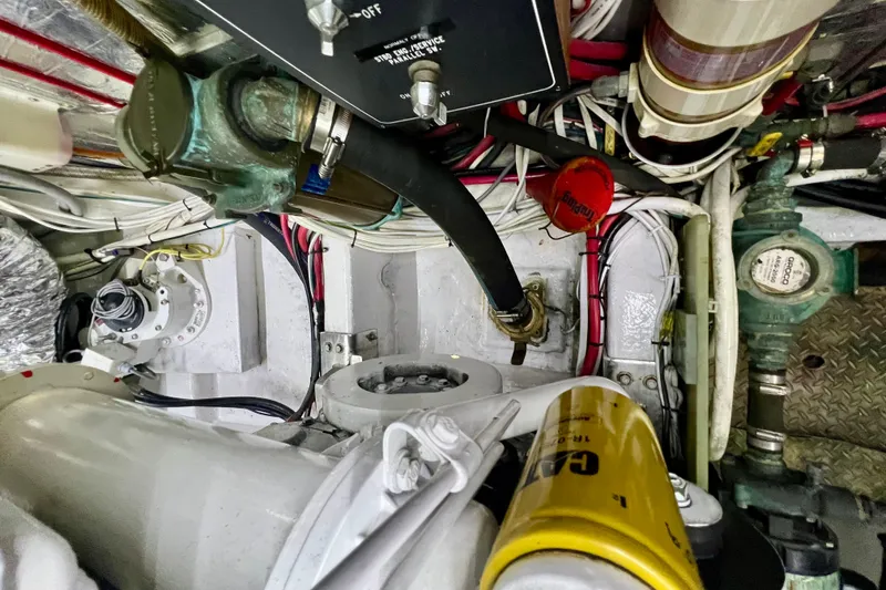Slide: The Image of Engine room of 2000 Ocean Alexander 430 Classicco with visible components and wiring. - 57