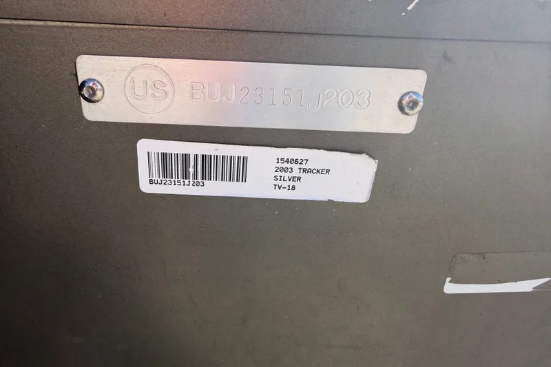 Slide: The Image of 2003 Tracker Tournament V-18 boat identification plate with serial number BUJ23151J203. - 20