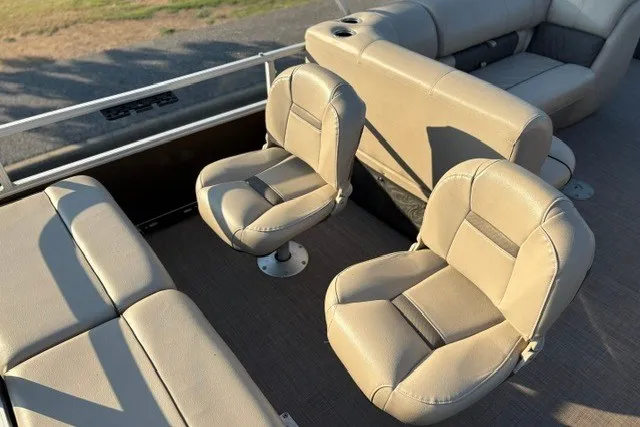Slide: The Image of 2020 Sun Tracker SportFish 22 XP3 boat interior with beige seating arrangement. - 42