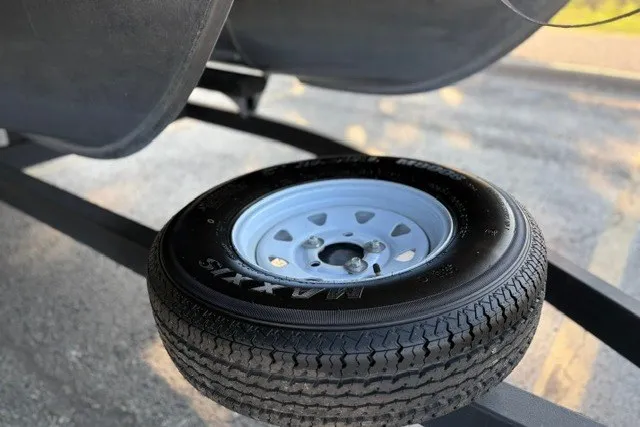 Slide: The Image of Spare tire on a 2020 Sun Tracker SportFish 22 XP3 trailer. - 55