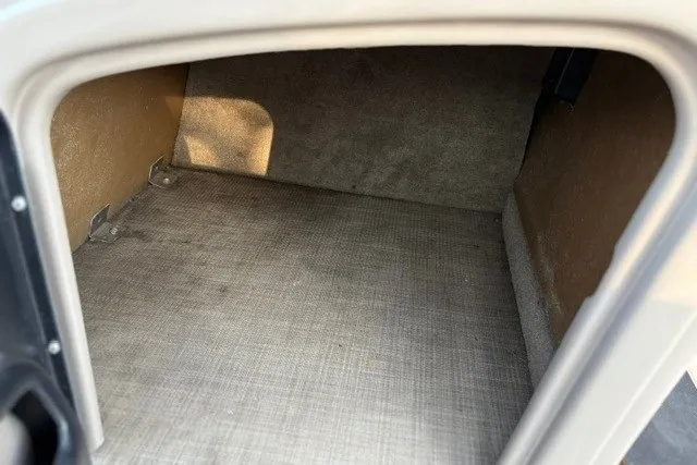 Slide: The Image of Storage compartment of a 2020 Sun Tracker SportFish 22 XP3 boat. - 33