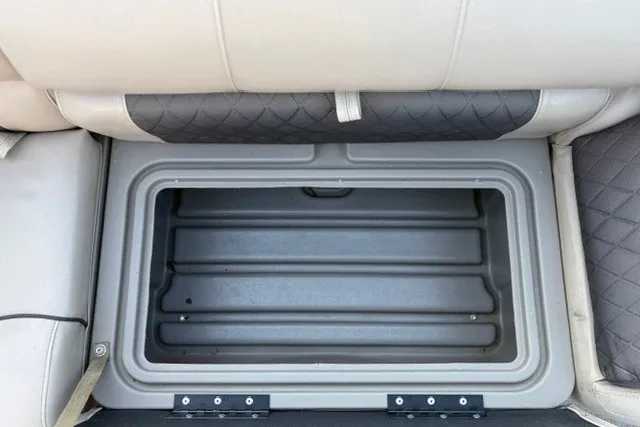 Slide: The Image of Storage compartment in 2020 Sun Tracker SportFish 22 XP3 boat seat. - 36