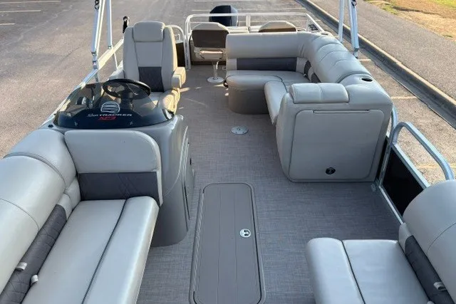 Slide: The Image of 2020 Sun Tracker SportFish 22 XP3 pontoon boat interior with spacious seating and helm. - 43