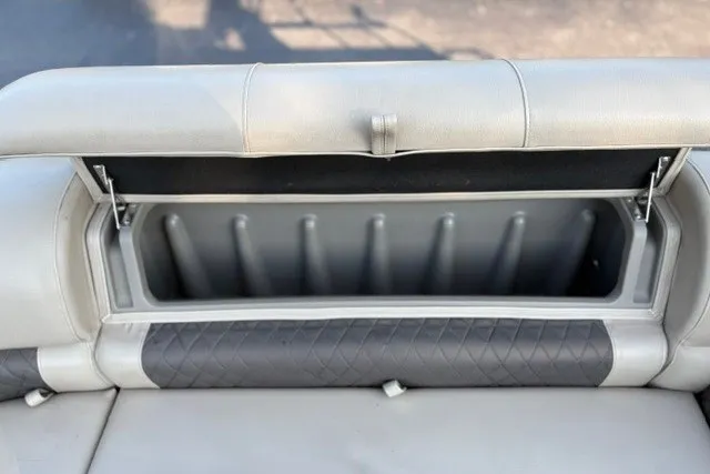 Slide: The Image of Storage compartment in 2020 Sun Tracker SportFish 22 XP3 boat seat. - 23