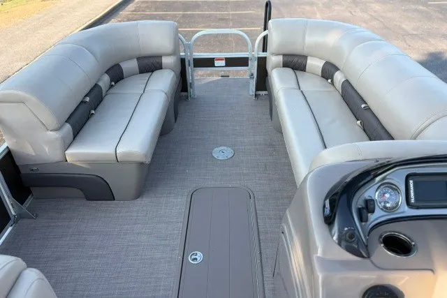 Slide: The Image of 2020 Sun Tracker SportFish 22 XP3 pontoon boat interior with spacious seating and modern dashboard. - 32