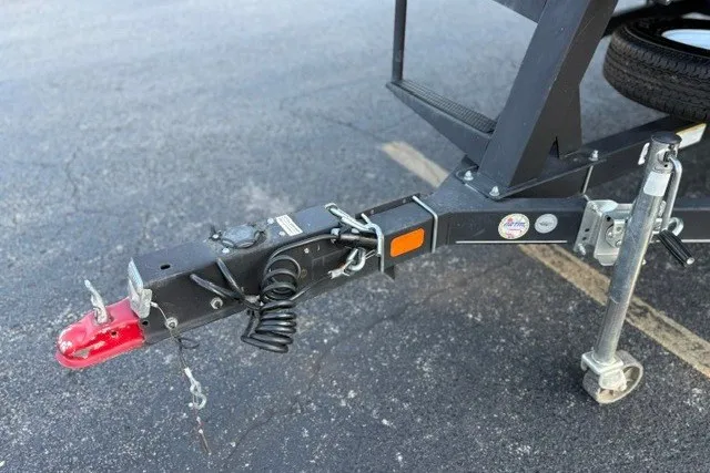 Slide: The Image of Trailer hitch of 2020 Sun Tracker SportFish 22 XP3 on asphalt surface. - 54