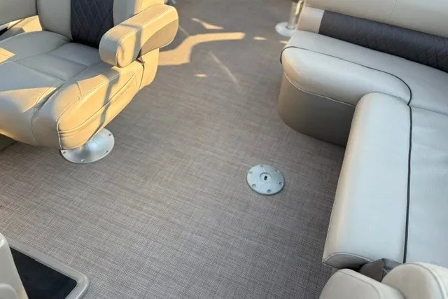 Slide: The Image of Interior of 2020 Sun Tracker SportFish 22 XP3 pontoon boat with beige seating. - 31