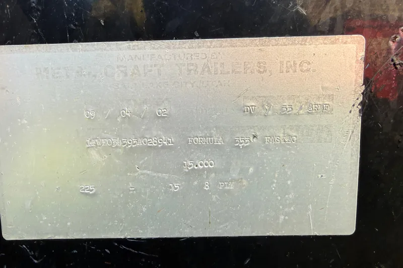 Slide: The Image of Metal identification plate for 2001 Formula 353 FASTech boat, showing specifications and serial number. - 46