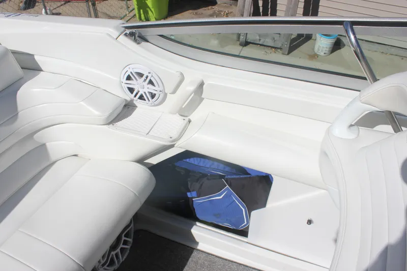 Slide: The Image of Interior of a 2001 Formula 353 FASTech boat with white seating and speaker. - 23