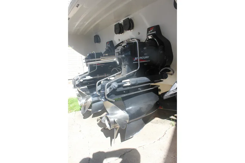 Slide: The Image of 2001 Formula 353 FASTech boat with Mercury outboard engines. - 38