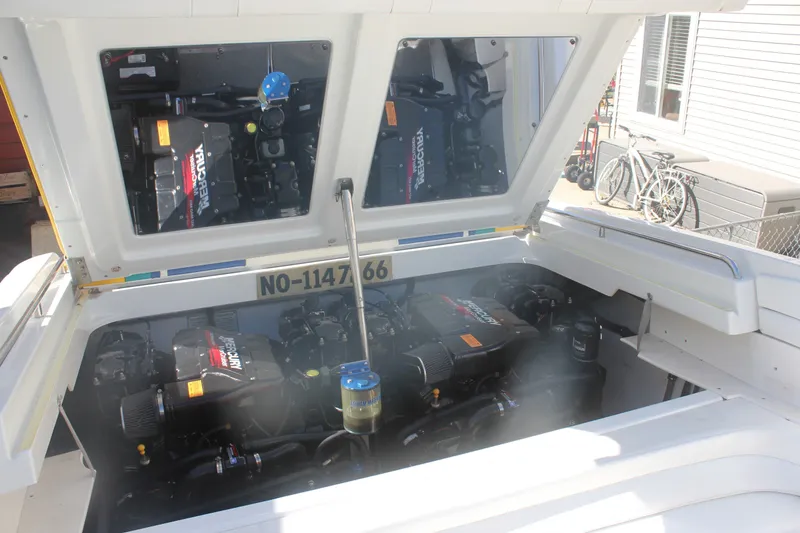 Slide: The Image of 2001 Formula 353 FASTech boat engine compartment with twin Mercury engines. - 26