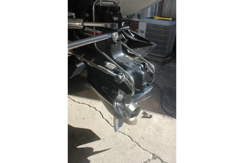 Slide: The Image of 2001 Formula 353 FASTech boat engine with Mercury outdrive in sunlight. - 40