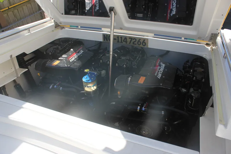 Slide: The Image of Engine compartment of a 2001 Formula 353 FASTech boat with Mercury engines. - 25