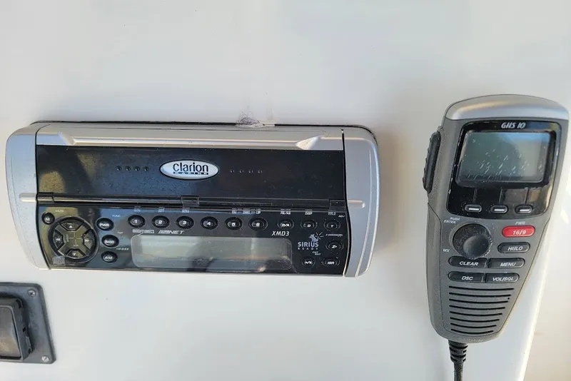 Slide: The Image of Clarion marine stereo and GHS 10 radio on 2004 Stamas 310 Tarpon boat. - 18
