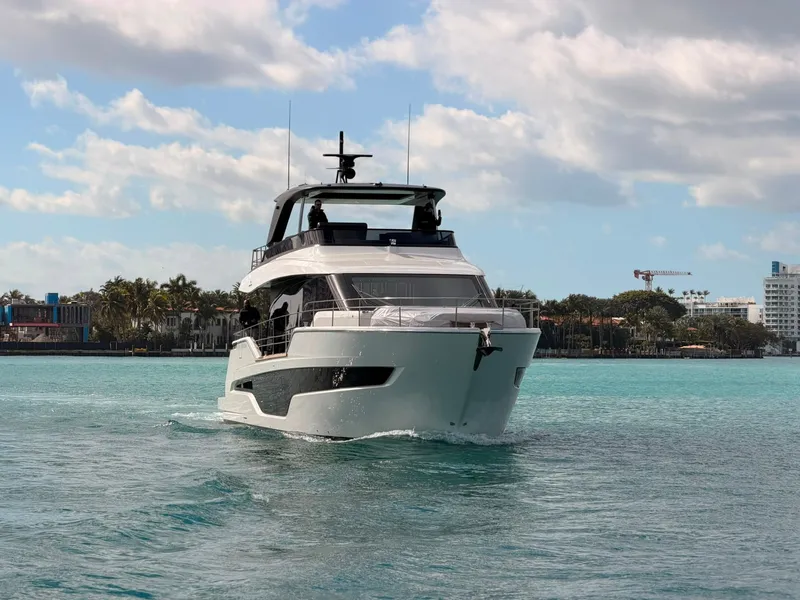 Slide: The Image of 2026 Cranchi Sessantassette 67 on calm waters with a sleek, modern design. - 33
