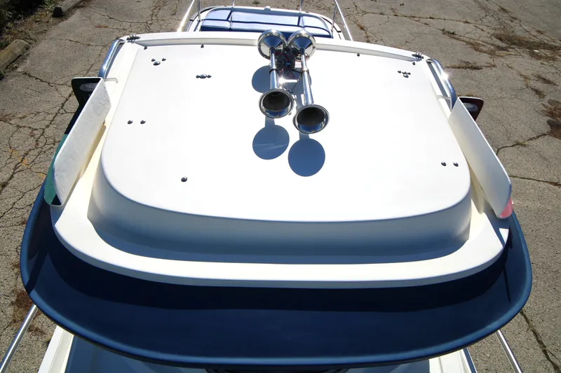 Slide: The Image of 2005 Ranger Tugs R-21 boat roof with dual horns, viewed from above. - 9