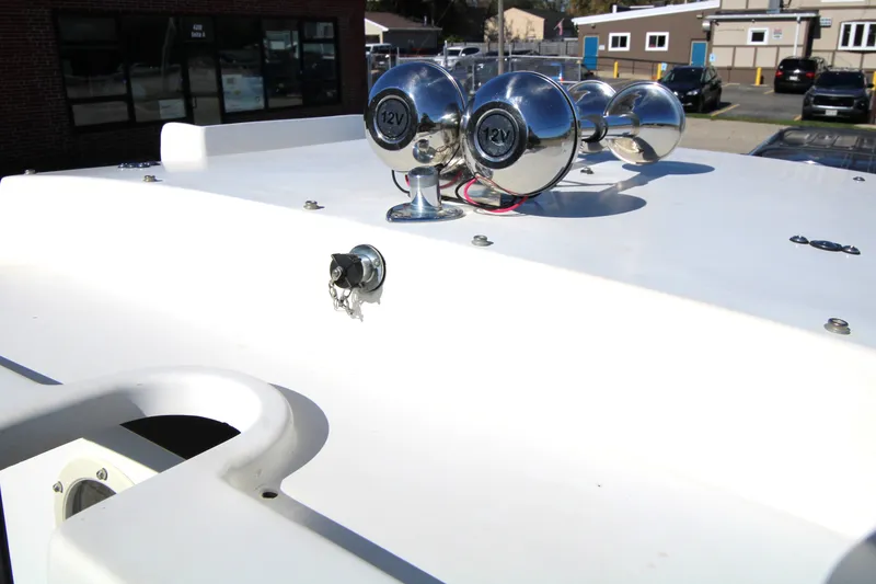 Slide: The Image of 2005 Ranger Tugs R-21 boat roof with dual 12V chrome horns. - 24