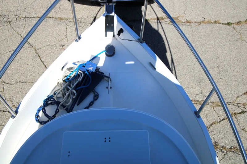 Slide: The Image of Bow of 2005 Ranger Tugs R-21 with anchor and ropes on deck. - 7