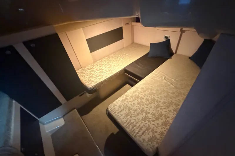 Slide: The Image of Interior cabin of 2013 Cranchi M 44 HT yacht with twin beds and cushions. - 13