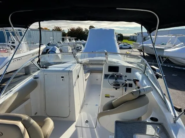 Slide: The Image of 2020 Key West 239 DFS boat interior with helm and seating. - 5