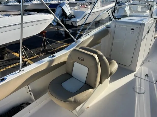 Slide: The Image of 2020 Key West 239 DFS boat interior with beige seating. - 4