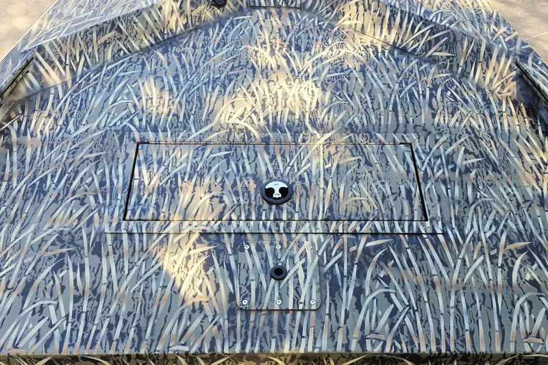 Slide: The Image of 2027 Tracker Grizzly 1648 SC boat with grass camouflage pattern. - 13