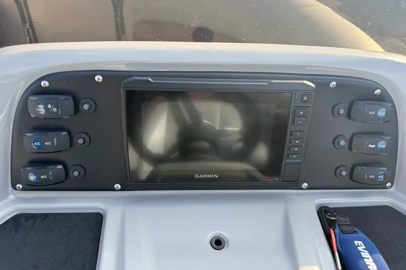Slide: The Image of Dashboard of a 2021 Manitou Aurora 21 boat with Garmin navigation system. - 13