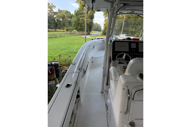 Slide: The Image of 2007 Robalo R300 Center Console boat interior with steering wheel and controls. - 5