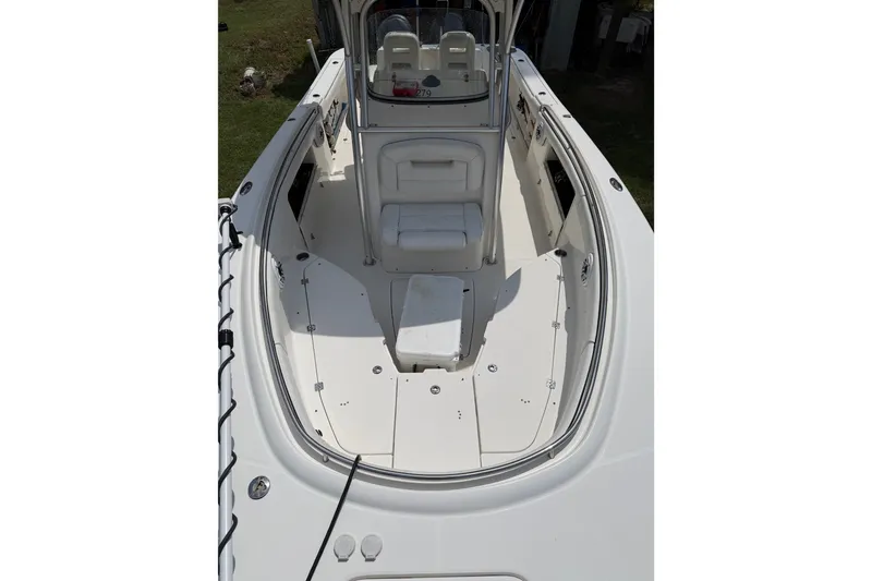 Slide: The Image of 2007 Robalo R300 Center Console boat interior, featuring spacious seating and sleek design. - 11