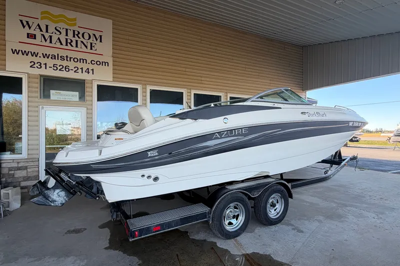 Slide: The Image of 2005 Azure AZ240 boat on trailer at Walstrom Marine dealership. - 2