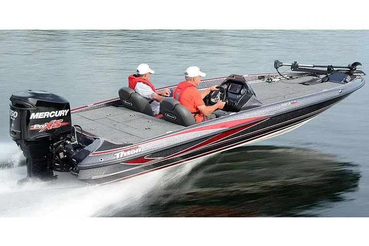 Slide: The Image of Manufacturer Provided Image: 2018 Triton 189 TrX bass boat speeding on water, featuring Mercury Pro XS engine. - 26
