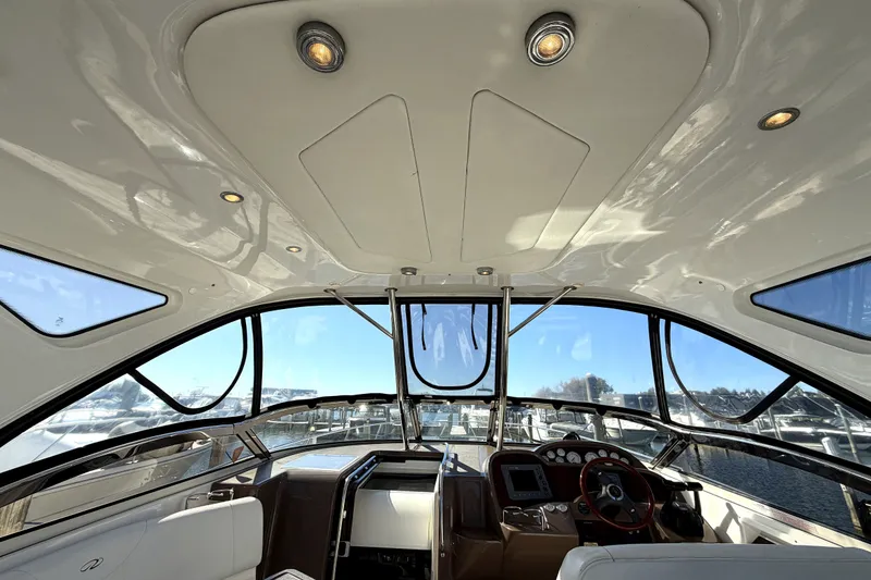 Slide: The Image of Interior view of 2006 Regal Commodore 3760 IO yacht cockpit with panoramic windows. - 8