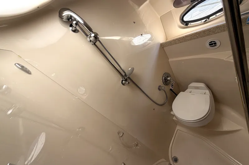 Slide: The Image of Bathroom interior of 2006 Regal Commodore 3760 IO yacht with shower and toilet. - 26