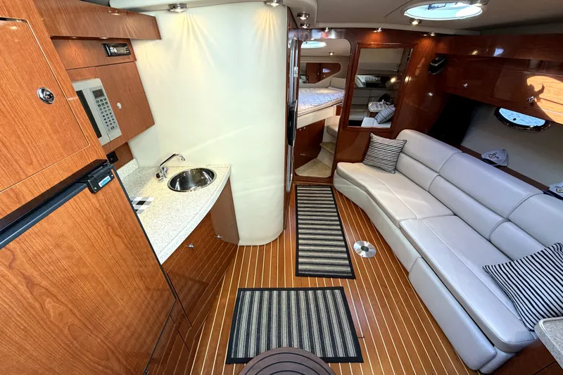 Slide: The Image of Luxurious interior of 2006 Regal Commodore 3760 IO yacht with modern amenities. - 15