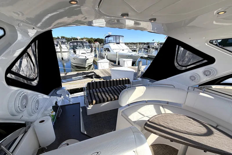 Slide: The Image of Interior view of 2006 Regal Commodore 3760 IO yacht at marina dock. - 14