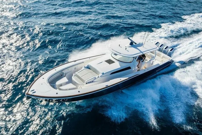 Slide: The Image of Valhalla V-55 2025 luxury boat cruising on open ocean waters. - 3