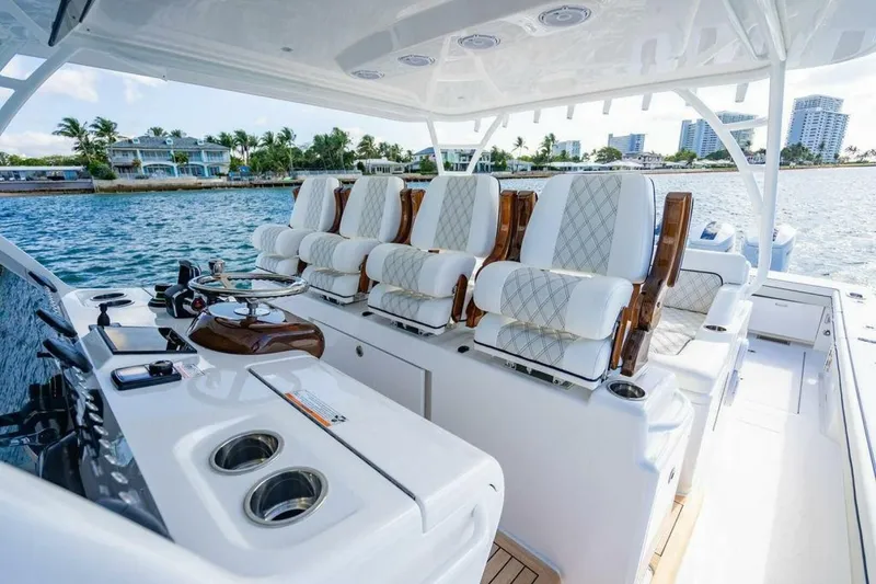 Slide: The Image of Luxurious 2025 Valhalla V-55 yacht interior with plush seating and modern controls. - 5