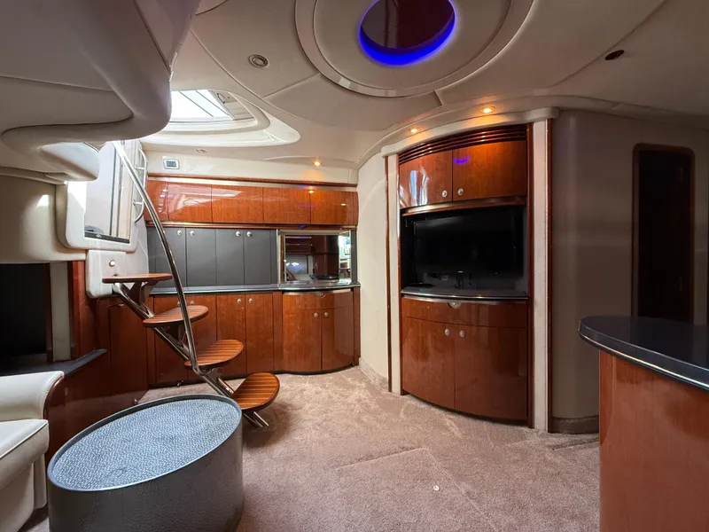 Slide: The Image of Luxurious interior of a 2003 Sea Ray 500 Sundancer yacht with modern amenities. - 16