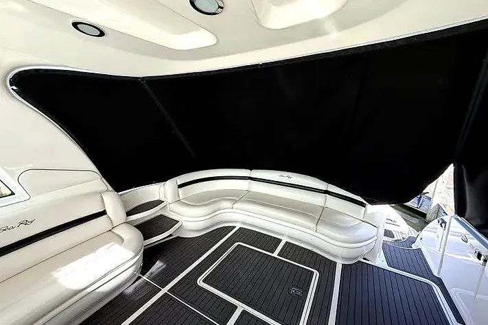 Slide: The Image of Luxurious interior of 2003 Sea Ray 500 Sundancer yacht with elegant seating and sleek design. - 9