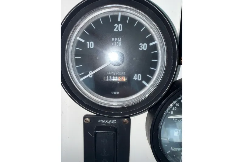 Slide: The Image of Close-up of 2002 Mainship Pilot 34 RPM gauge showing engine hours. - 22