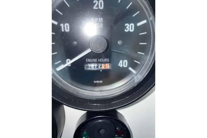Slide: The Image of Close-up of a 2002 Mainship Pilot 34 engine hour meter displaying 1,724 hours. - 23