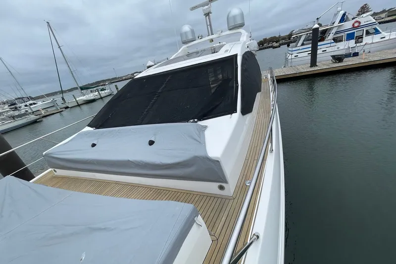 Slide: The Image of BOW DECK LOOKING AFT W/WEATHER COVERS & WINDOW SUNSCREENS - 75