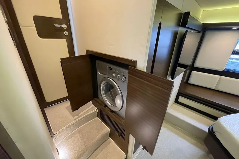 Slide: The Image of WASHER/DRYER COMBO UNIT IN MASTER CABINETRY - 42
