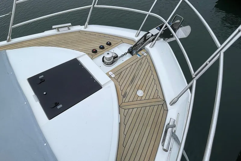 Slide: The Image of BOW DECK WITH TEAK SOLE AND WINDLASS ANCHOR W/REMOTE FOOT PEDAL CONTROLS - 79