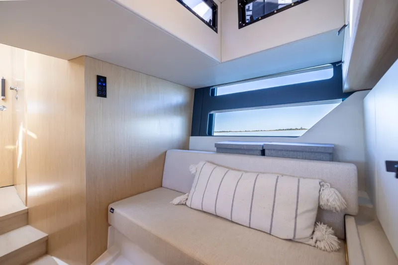 Slide: The Image of Luxurious interior of 2023 Fjord 41 XL yacht with modern seating and natural light. - 61