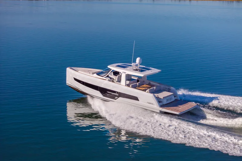 Slide: The Image of 2023 Fjord 41 XL yacht cruising on calm blue waters. - 63