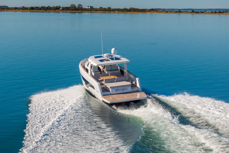 Slide: The Image of 2023 Fjord 41 XL yacht cruising on calm blue waters. - 66