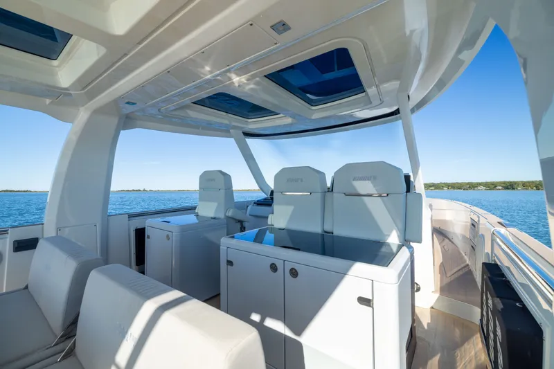 Slide: The Image of Luxurious interior of 2023 Fjord 41 XL yacht with modern seating and ocean view. - 23